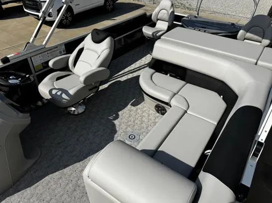 Slide: The Image of Luxurious interior of 2025 South Bay 224RS LE pontoon boat with plush seating. - 3