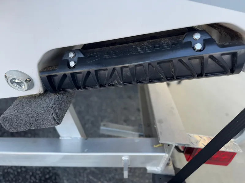 Slide: The Image of 2024 Sportsman Open 252 Center Console boat detail with Seakeeper component. - 12