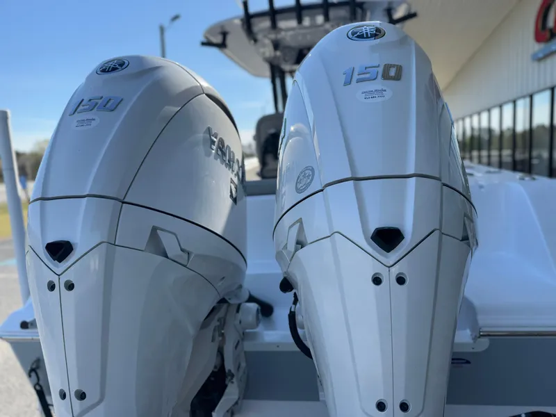 Slide: The Image of 2024 Sportsman Open 252 Center Console with twin 150 horsepower engines. - 9