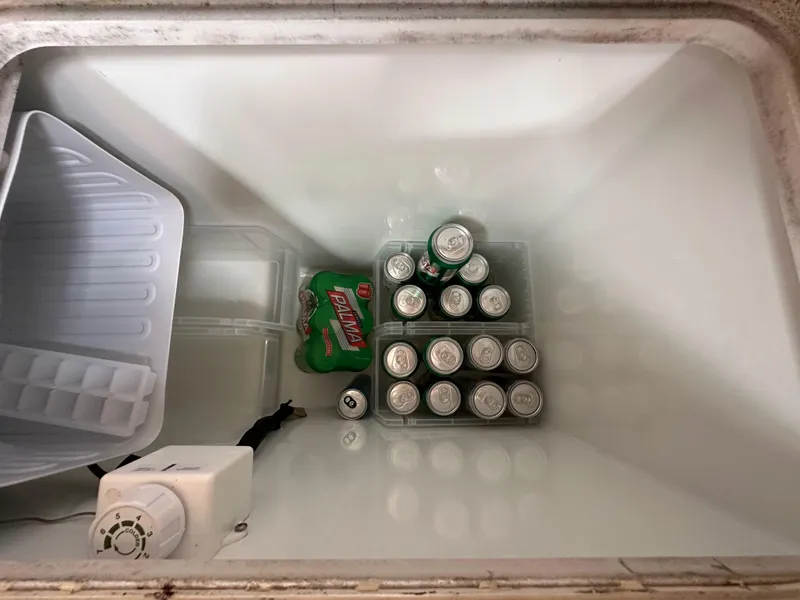 Slide: The Image of Refrigerator on 2003 Jeanneau Sun Odyssey 32 yacht with soda cans inside. - 47