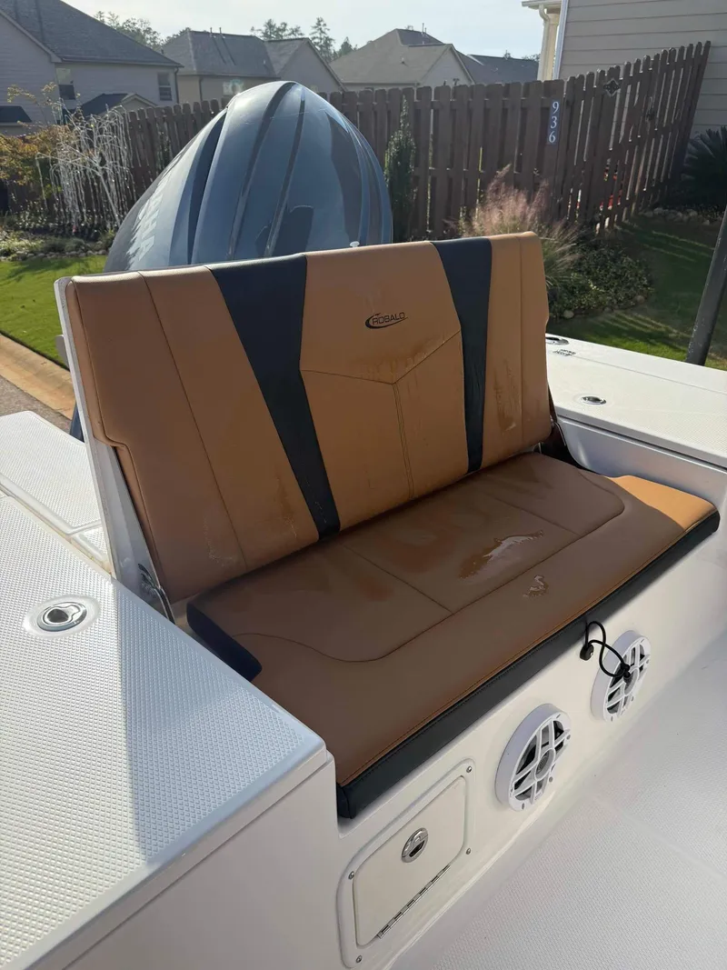 Slide: The Image of 2024 Robalo 226 Cayman boat seat with tan and black upholstery. - 4