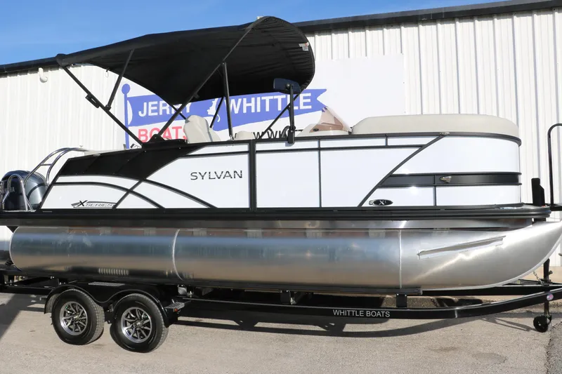 Slide: The Image of 2025 Sylvan Mirage X X1 CLZ DH pontoon boat on trailer, side view. - 13