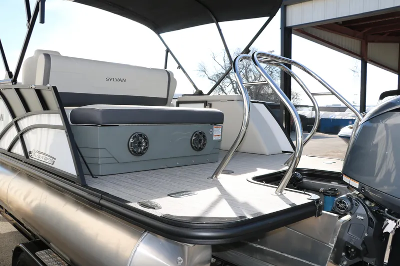 Slide: The Image of 2025 Sylvan Mirage X X1 CLZ DH pontoon boat with sleek seating and modern design. - 8