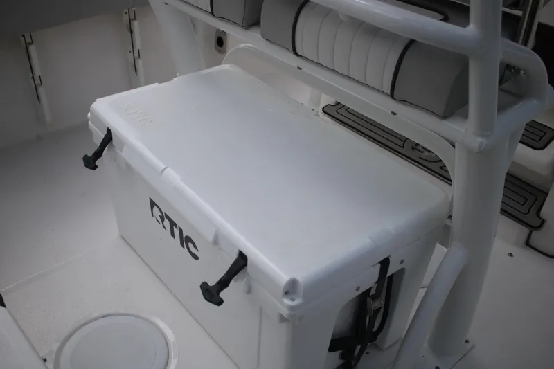Slide: The Image of 2023 Sea Fox 228 boat interior with RTIC cooler and seating. - 17