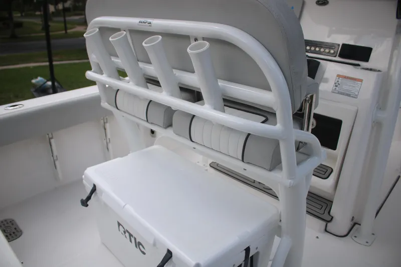 Slide: The Image of 2023 Sea Fox 228 boat interior with rod holders and RTIC cooler. - 18