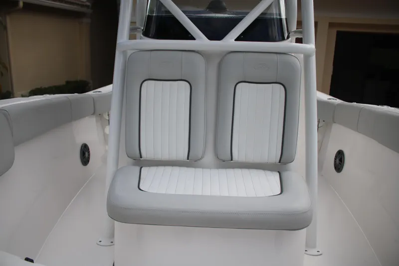 Slide: The Image of 2023 Sea Fox 228 boat seating area with cushioned seats and sleek design. - 24