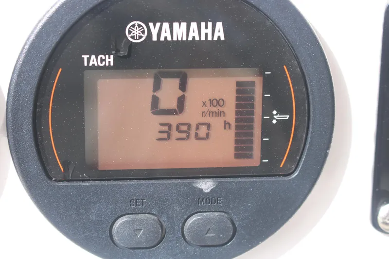 Slide: The Image of Yamaha tachometer displaying 390 hours on a 2023 Sea Fox 228 boat. - 6