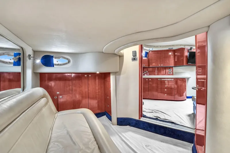 Slide: The Image of Luxurious interior of 2004 Sea Ray 460 Sundancer yacht with elegant wood cabinetry. - 27