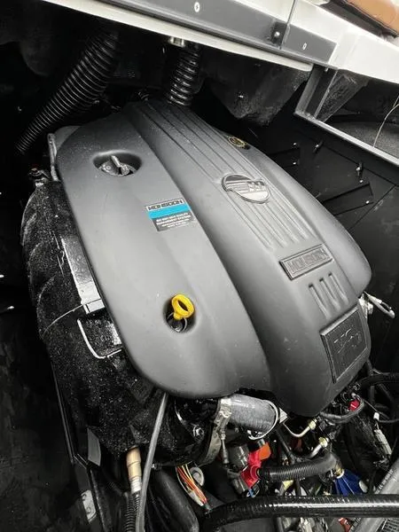 Slide: The Image of Engine of 2025 Malibu 24 MXZ boat, showcasing sleek design and advanced engineering. - 27