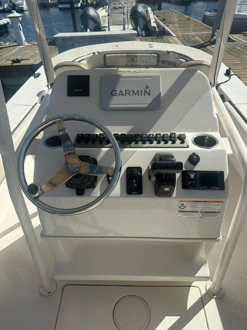 Slide: The Image of 2023 Carolina Skiff 24 Ultra Elite boat console with Garmin navigation system. - 9