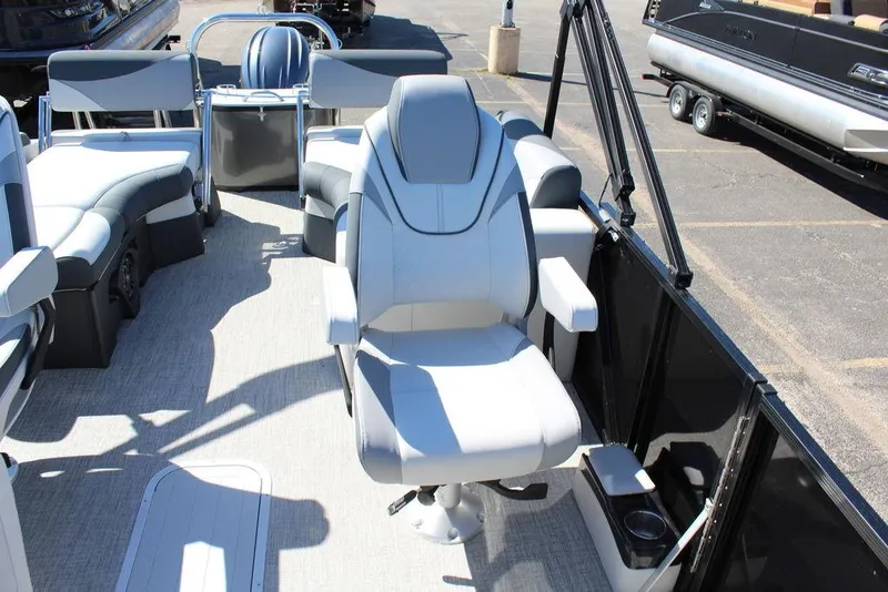 Slide: The Image of 2025 Avalon LSZ 2185 Quad Lounge boat interior with modern seating and sleek design. - 12