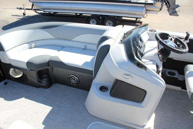 Slide: The Image of 2025 Avalon LSZ 2185 Quad Lounge Shift interior with sleek seating and modern dashboard. - 21