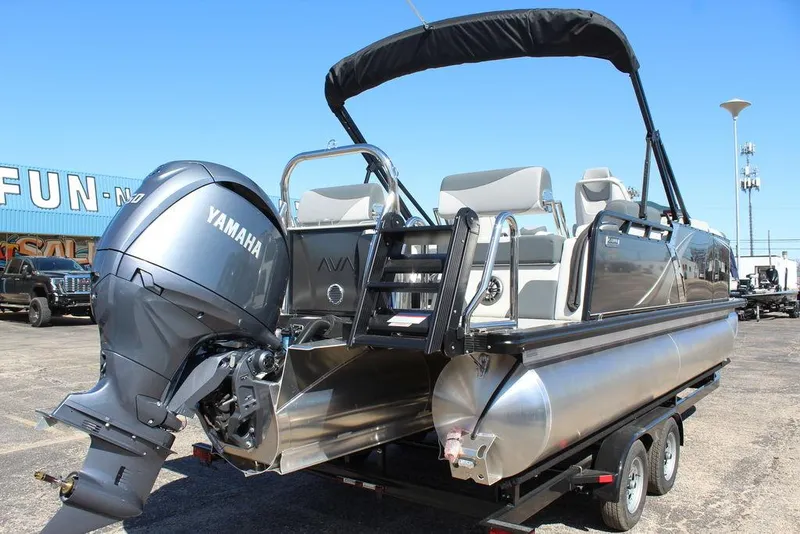 Slide: The Image of 2025 Avalon LSZ 2185 Quad Lounge pontoon boat with Yamaha engine on trailer. - 3