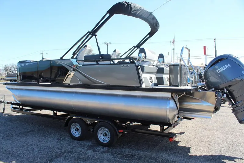 Slide: The Image of 2025 Avalon LSZ 2185 Quad Lounge pontoon boat on trailer with Yamaha engine. - 4