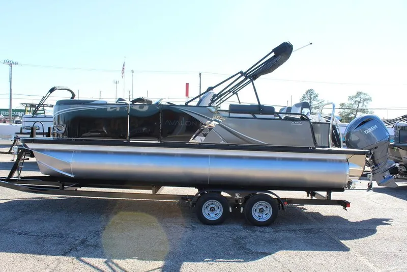 Slide: The Image of 2025 Avalon LSZ 2185 Quad Lounge Shift pontoon boat on trailer, side view. - 6
