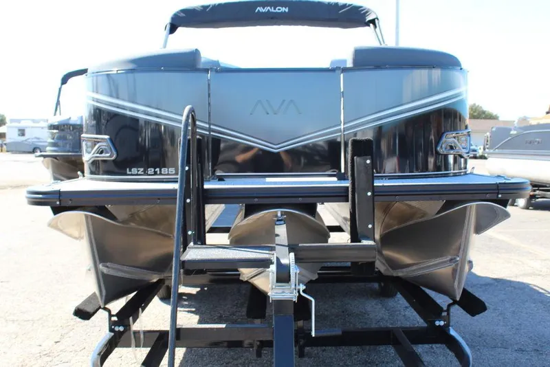 Slide: The Image of 2025 Avalon LSZ 2185 Quad Lounge Shift pontoon boat on trailer, rear view. - 8