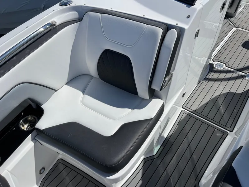 Slide: The Image of Luxury seating on 2022 Monterey M65 boat with sleek design and modern upholstery. - 14
