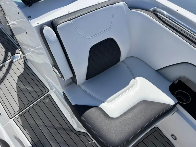 Slide: The Image of Luxury seating on 2022 Monterey M65 boat with black and white upholstery. - 15