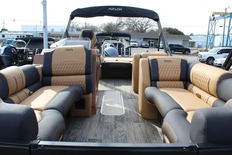 Slide: The Image of 2025 Avalon Catalina Versatile Rear Bench 23 FT pontoon boat with luxurious seating and modern design. - 10