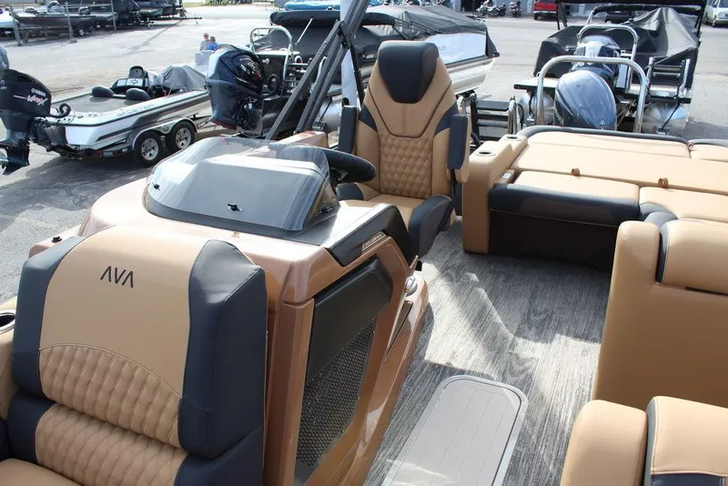 Slide: The Image of 2025 Avalon Catalina Versatile Rear Bench 23 FT boat interior with luxurious seating and modern design. - 15