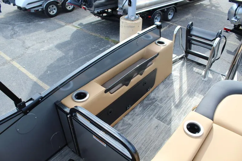 Slide: The Image of 2025 Avalon Catalina Versatile Rear Bench, 23 FT, featuring sleek seating and cup holders. - 19