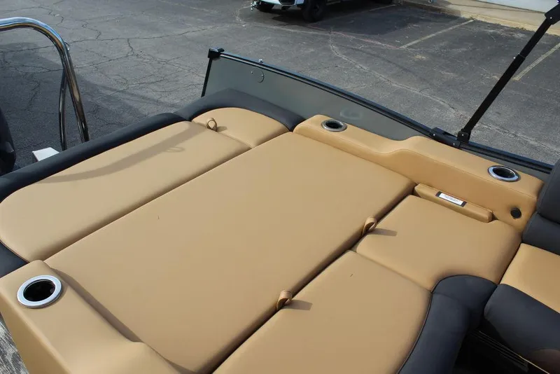 Slide: The Image of 2025 Avalon Catalina Versatile Rear Bench, 23 FT, tan seating with cup holders. - 20
