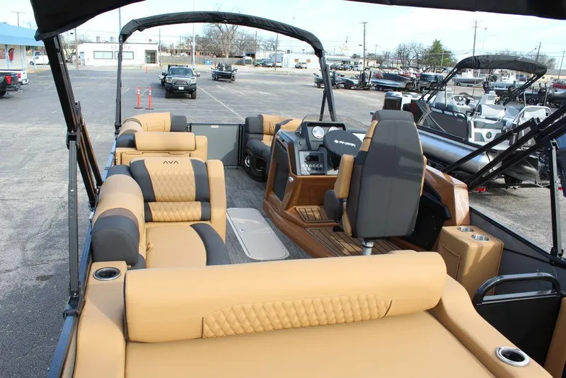 Slide: The Image of 2025 Avalon Catalina Versatile Rear Bench 23 FT pontoon boat with luxurious seating and modern design. - 24