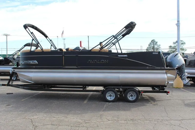 Slide: The Image of 2025 Avalon Catalina Versatile Rear Bench 23 FT pontoon boat on trailer. - 5