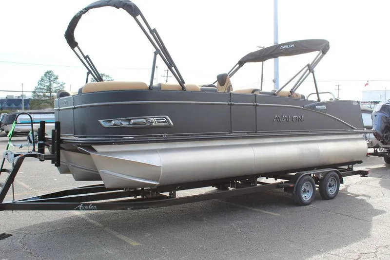 Slide: The Image of 2025 Avalon Catalina Versatile Rear Bench 23 FT pontoon boat on trailer. - 7