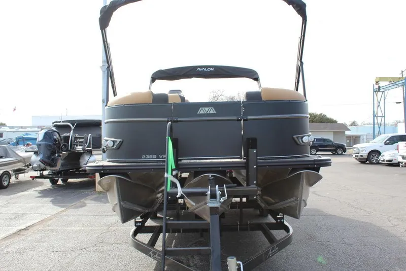 Slide: The Image of 2025 Avalon Catalina Versatile Rear Bench 23 FT pontoon boat on trailer. - 9