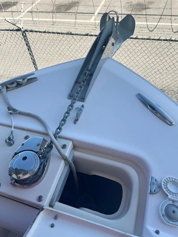 Slide: The Image of 2007 Grady-White Tournament 275 boat anchor and chain mechanism on deck. - 16