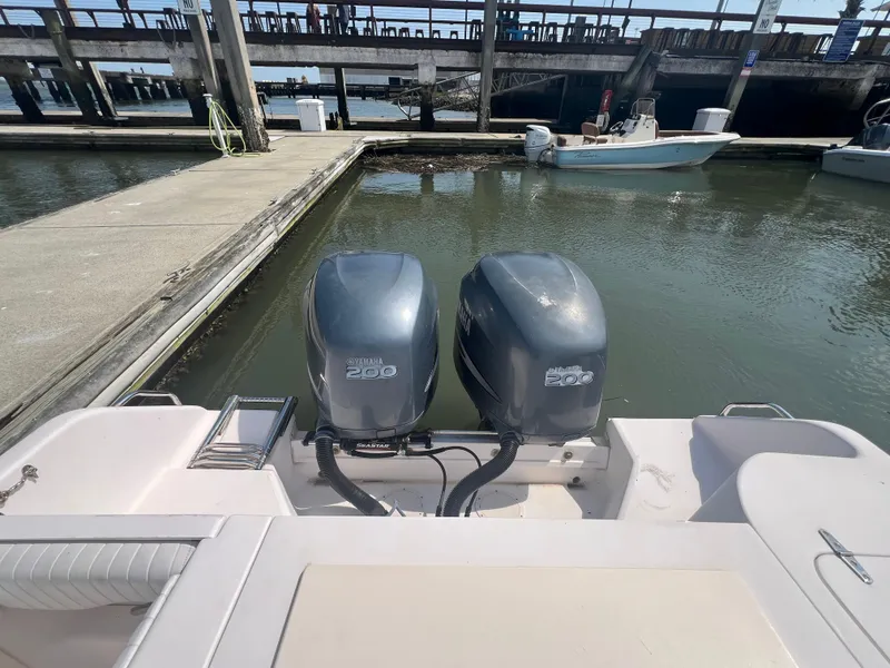 Slide: The Image of 2007 Grady-White Tournament 275 with twin 250 horsepower engines docked at marina. - 17