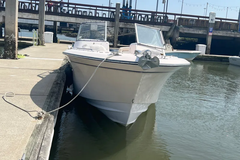 Slide: The Image of 2007 Grady-White Tournament 275 boat docked at marina, front view. - 20
