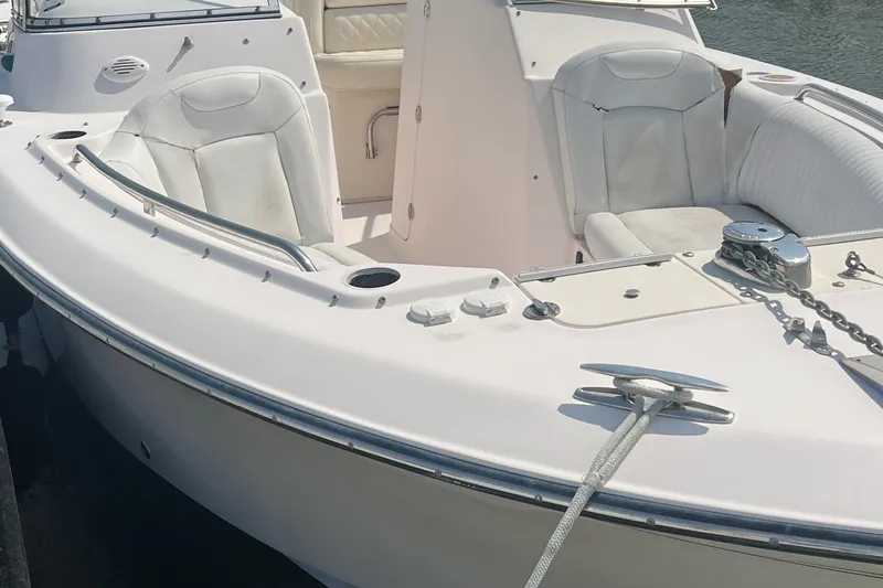 Slide: The Image of 2007 Grady-White Tournament 275 boat with white seating and anchor chain. - 21