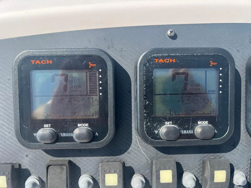 Slide: The Image of Dashboard of a 2007 Grady-White Tournament 275 boat with Yamaha tachometers. - 6