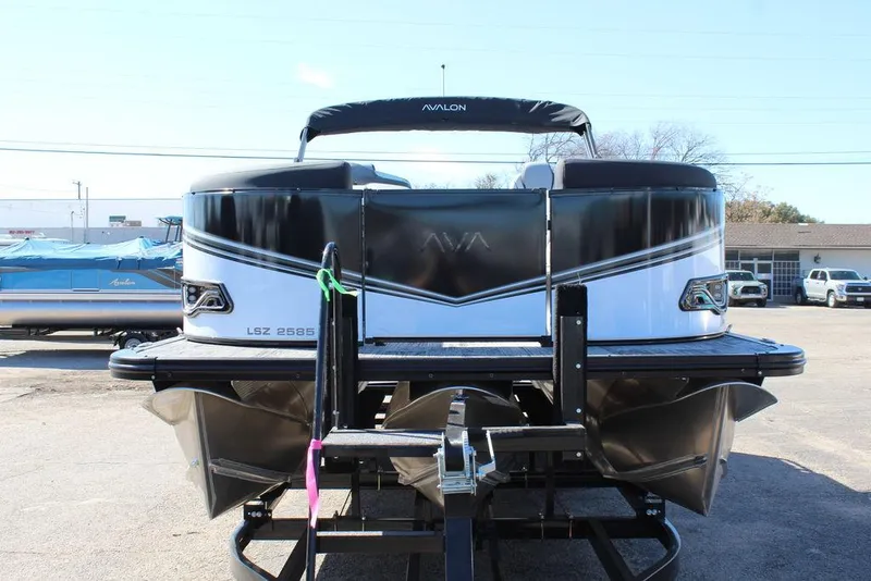 Slide: The Image of 2025 Avalon LSZ Quad Lounge Shift 25 FT pontoon boat on trailer. - 10