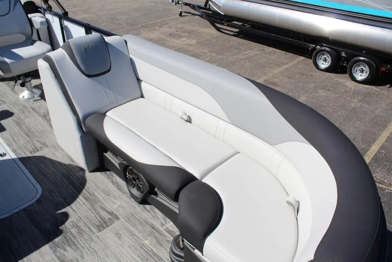 Slide: The Image of 2025 Avalon LSZ Quad Lounge Shift 25 FT boat interior with sleek, modern seating design. - 16