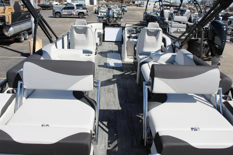 Slide: The Image of 2025 Avalon LSZ Quad Lounge Shift 25 FT pontoon boat interior with modern seating. - 23