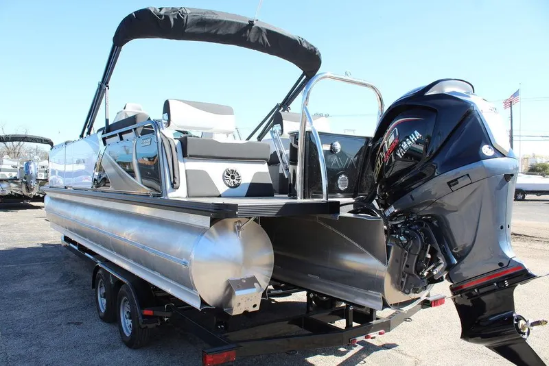 Slide: The Image of 2025 Avalon LSZ Quad Lounge Shift 25 FT pontoon boat with Yamaha outboard motor. - 4