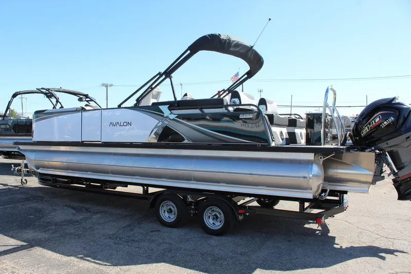 Slide: The Image of 2025 Avalon LSZ Quad Lounge Shift 25 FT pontoon boat on trailer. - 7