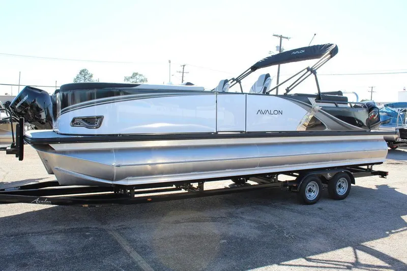 Slide: The Image of 2025 Avalon LSZ Quad Lounge Shift 25 FT pontoon boat on a trailer. - 8
