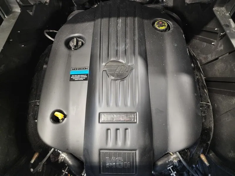 Slide: The Image of 2025 Malibu 24 MXZ engine, showcasing a modern, powerful design. - 25