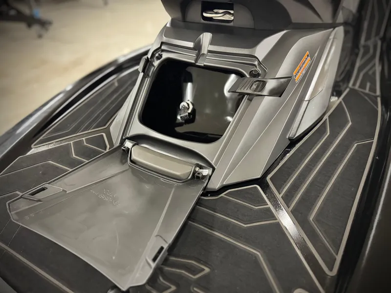 Slide: The Image of 2021 Yamaha WaveRunner FX Cruiser SVHO storage compartment, open and empty, showcasing sleek design. - 10