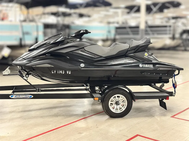 Slide: The Image of 2021 Yamaha WaveRunner FX Cruiser SVHO on trailer in showroom setting. - 4