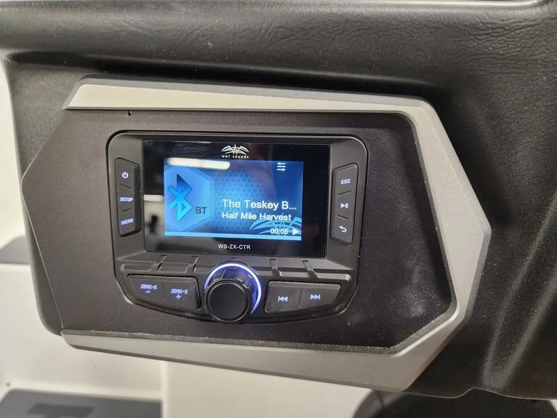 Slide: The Image of 2025 Axis T235 stereo system displaying music track information on screen. - 16