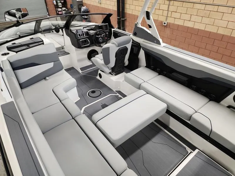 Slide: The Image of Luxurious interior of 2025 Axis T235 boat with modern seating and sleek design. - 18