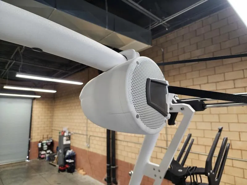 Slide: The Image of 2025 Axis T235 speaker mounted in a modern industrial setting. - 20