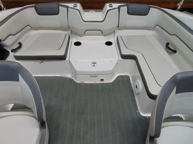 Slide: The Image of 2021 Yamaha Boats SX190 interior with spacious seating and modern design. - 10