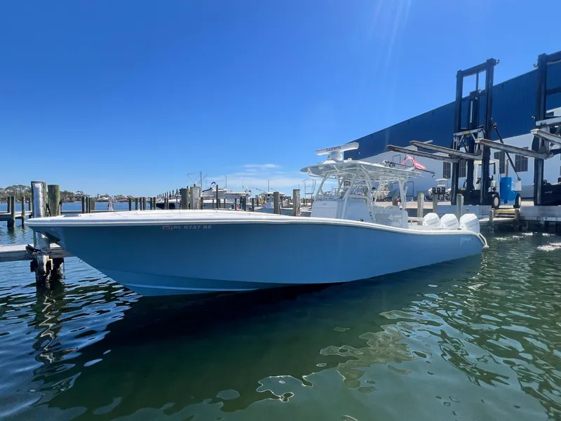 The Image of 2021 Yellowfin 36 Offshore boat docked in sunny marina. - 0