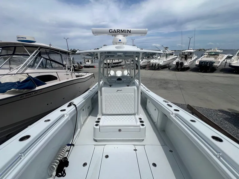 Slide: The Image of 2021 Yellowfin 36 Offshore boat with Garmin equipment, docked at a marina. - 35